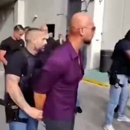 Video | Andrew Tate in de boeien geslagen na aanhouding in Miami